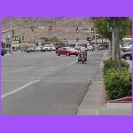 Man Pulling Dog In A Wagon.jpg